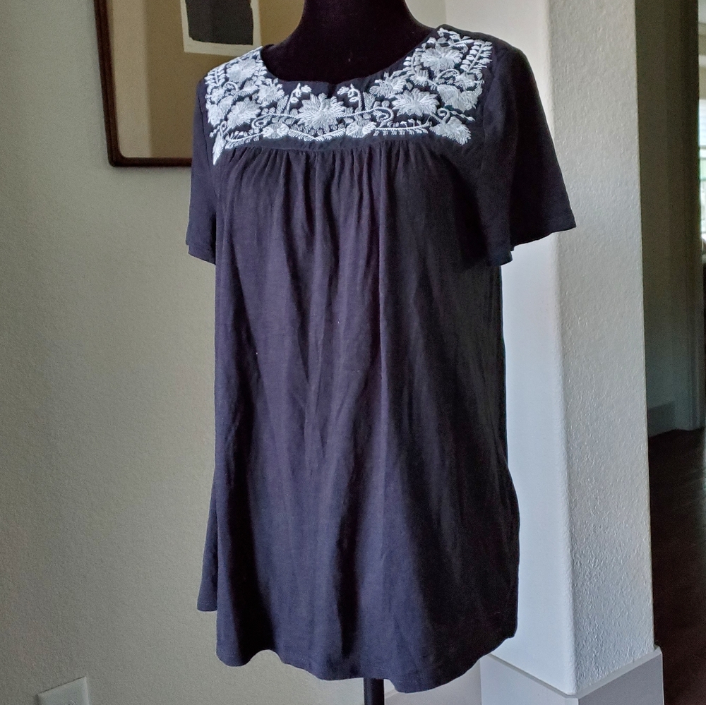 NWOT. Black shirt sleeved embroidery top. NWOT